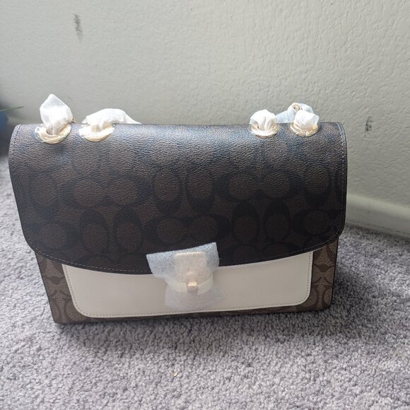 Lane Shoulder Bag In Blocked Signature Canvas - Picture 1 of 8